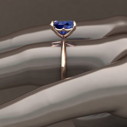 Custom dark blue sapphire solitaire ring in 14k rose gold - Image 6