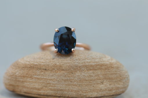 Custom dark blue sapphire solitaire ring in 14k rose gold - Image 2