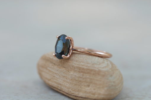 Custom dark blue sapphire solitaire ring in 14k rose gold - Image 3