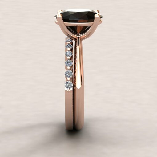 Custom black blue sapphire solitaire ring in 14k rose gold with moissanite band - Image 9