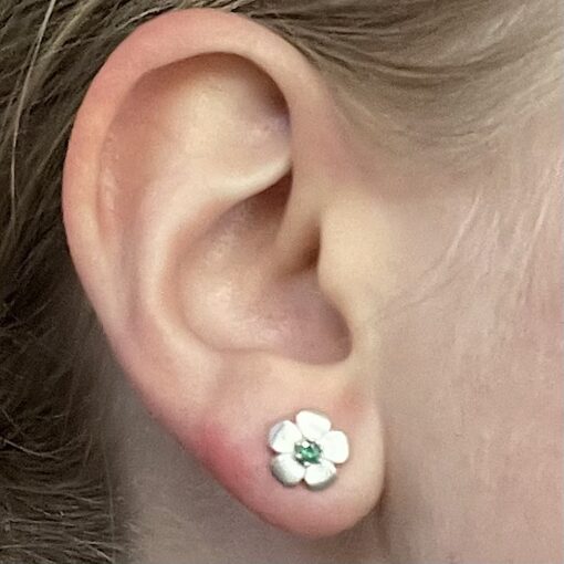 Emerald Birthstone Flower Earrings on Model in Platinum LS4572